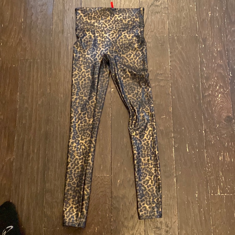 Size small spanx leopard print leggings.  Work 1 time.